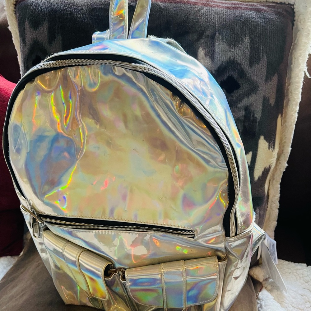 Large shiny metallic silver backpack